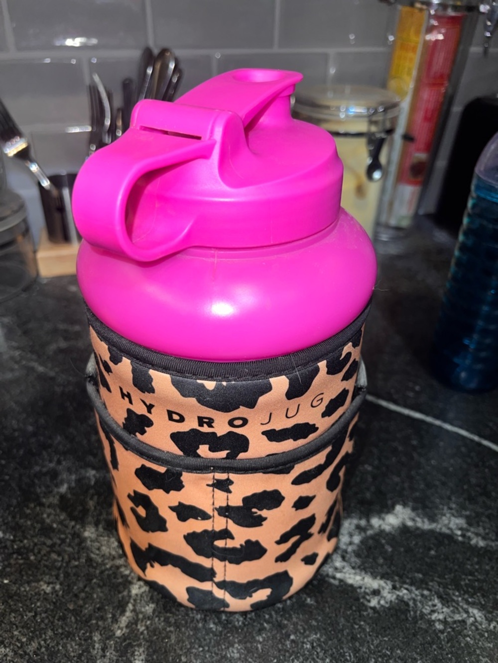 Hot pink hydrojug with leopard sleeve
